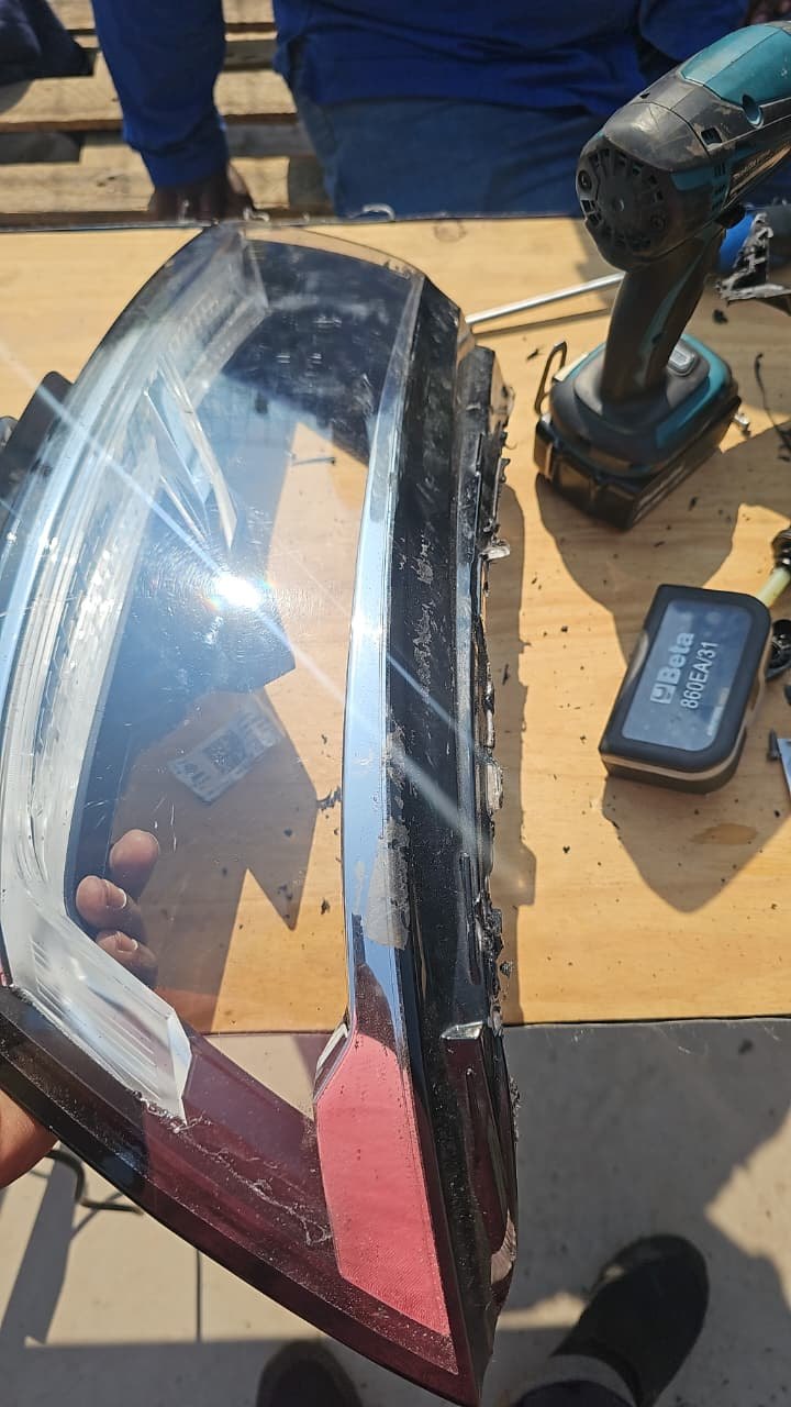 Headlight lens being removed